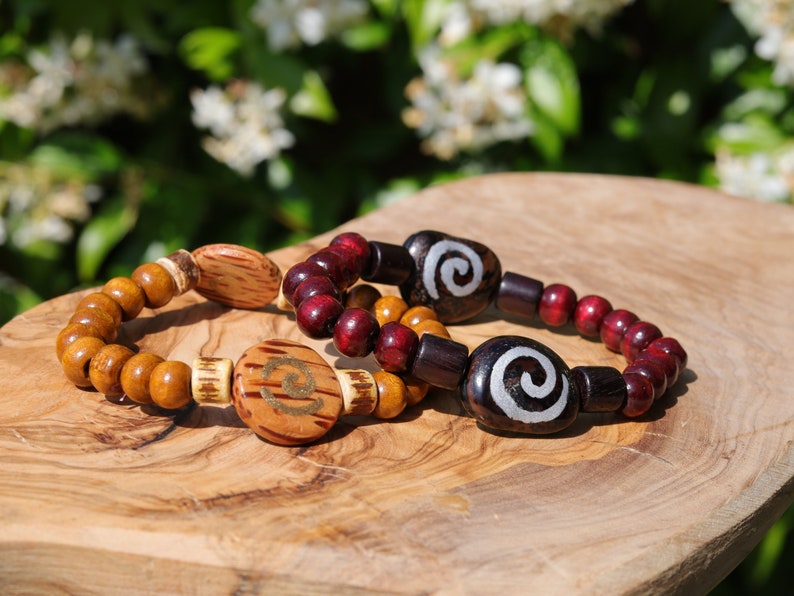 Wooden collection - 2x BRACELETS Cherry Red/ brown roundel 8x7mm Natural Wood with Wooden spiral beads.  mysterious symbol of space