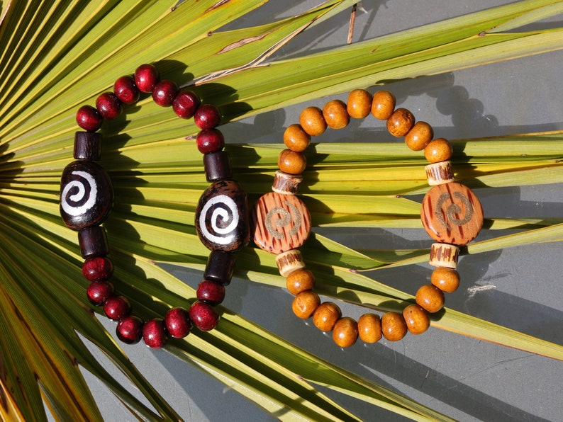 Wooden collection - 2x BRACELETS Cherry Red/ brown roundel 8x7mm Natural Wood with Wooden spiral beads.  mysterious symbol of space