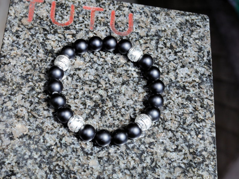 Amiable 10 mm black MATT Agate/carnelian combined with beautiful shiny Silver Color Plated rondelle. Beautiful spiritual gemstones