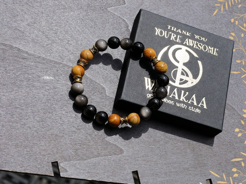 Engaging natural wood lace with Rainbow Obsidian combined Diabolo / Rondel. calming fears and insecurities and strengthening one’s courage.