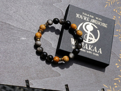 Engaging natural wood lace with Rainbow Obsidian combined Diabolo / Rondel. calming fears and insecurities and strengthening one’s courage.