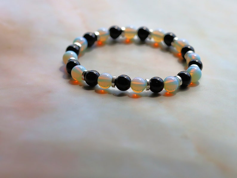 Wonderful Opalite bracelet combined with Black Agate. Nice combination known as a good luck stone. beautiful appearance