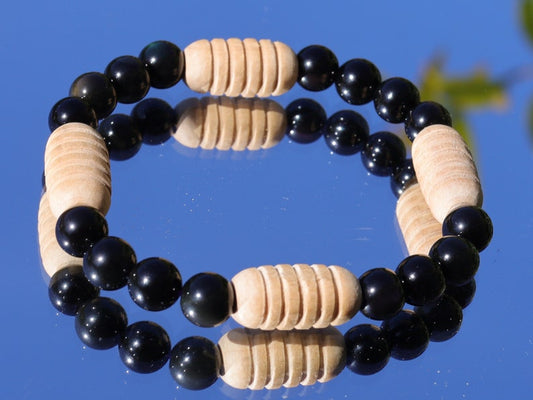 Easy going Natural Obsidian Grade AA, with Turned wooden beads. Symbolically, wood has a strong connection with the Earth and nature.