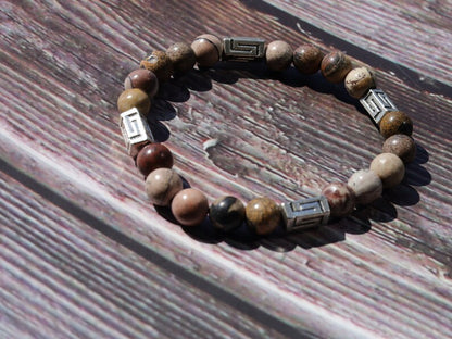 Visible Rhodonite Beaded bracelet with Antique Silver Tone Spacer Beads Pentagon. your emotions to the point of clarity and refinement