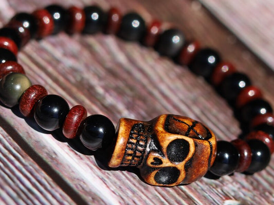 Disturbing  Obsidian Grade AA, with  wooden spacer beads. Symbolically, wood has a strong connection with the Earth and nature.