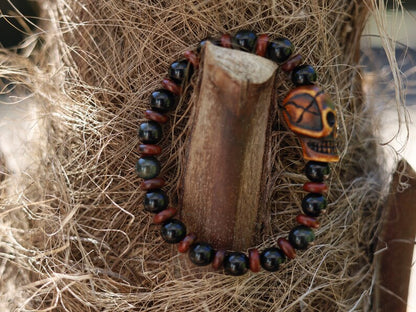 Disturbing  Obsidian Grade AA, with  wooden spacer beads. Symbolically, wood has a strong connection with the Earth and nature.