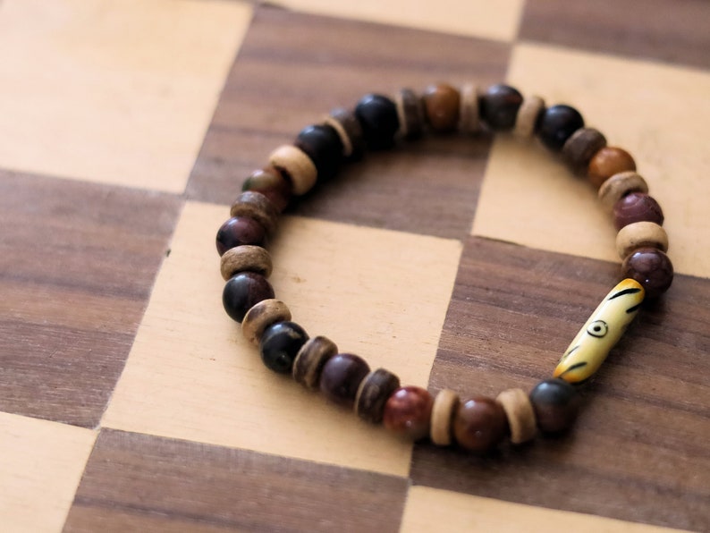 Rare Natural Picasso Stone/Picasso Jasper Bead bracelet combined with beautiful Disc coconut and  fantastic handmade bone bead from Africa.