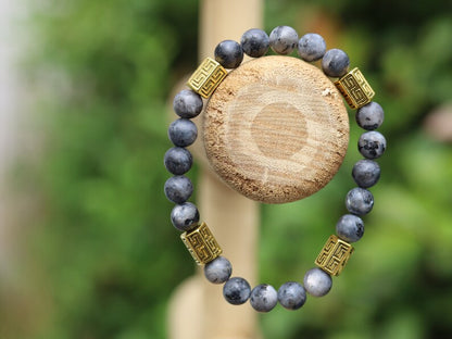 Modish Larvikite bracelet with beautiful Antique gold Tone Spacer Beads Pentagon.  Protect you in your day to day activities