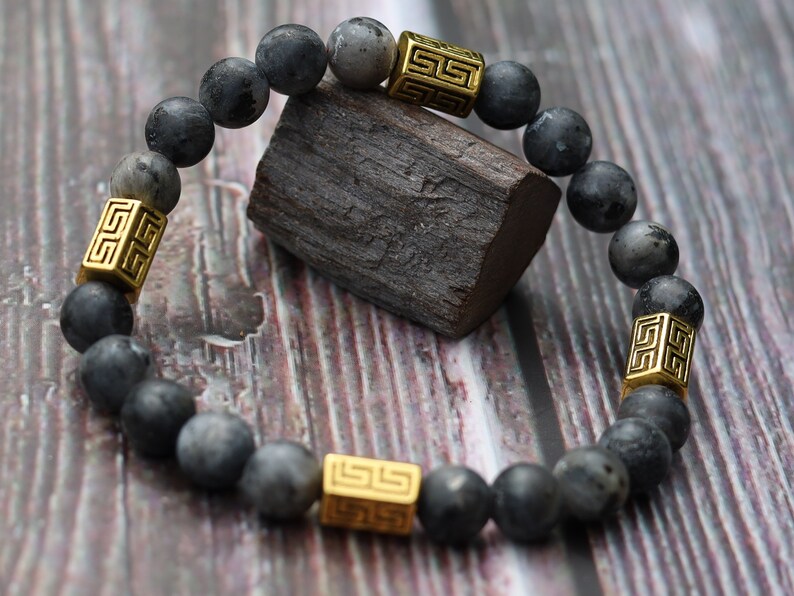 Modish Larvikite bracelet with beautiful Antique gold Tone Spacer Beads Pentagon.  Protect you in your day to day activities