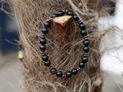 Curious matte Agate combined with Grade A Non-magnetic Hematite Rondelle Multi-color Plated.  Strung on durable stretchy cord