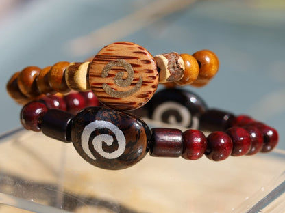 Wooden collection - 2x BRACELETS Cherry Red/ brown roundel 8x7mm Natural Wood with Wooden spiral beads.  mysterious symbol of space