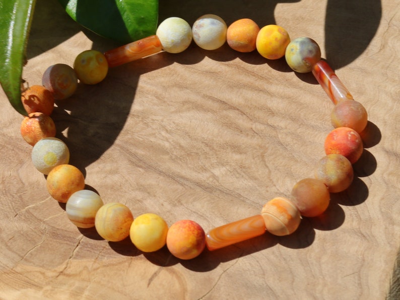 Unique Multicolored sunstone matt orange natural stone beads bracelet combined with 3x Carnelian tube beads.