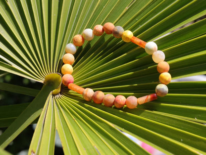 Unique Multicolored sunstone matt orange natural stone beads bracelet combined with 3x Carnelian tube beads.