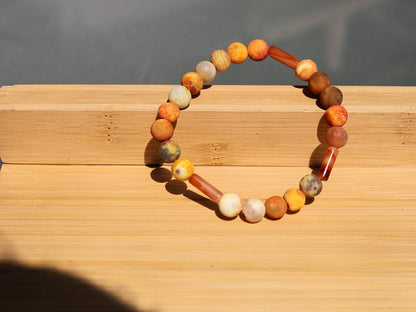 Unique Multicolored sunstone matt orange natural stone beads bracelet combined with 3x Carnelian tube beads.