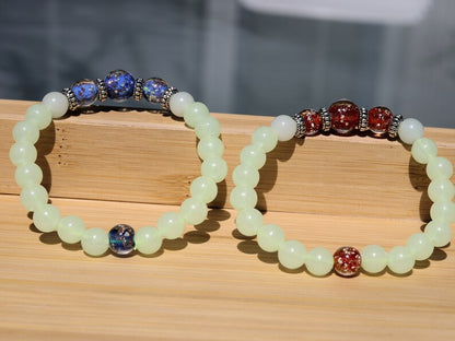 Glow in the dark - 2x bracelets glow in the dark green/ blue beads with amazing handcrafted red/ blue glow in the dark  lampwork beads.