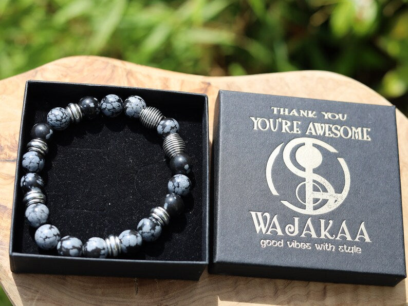 Astonishing 11 mm Snowflake Obsidian bracelet with Antique Silver, Rondelle. It can bring about a balance to body, mind and spirit