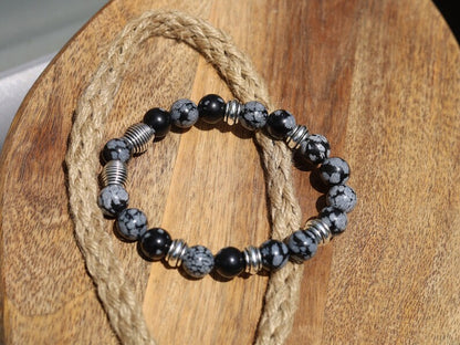 Astonishing 11 mm Snowflake Obsidian bracelet with Antique Silver, Rondelle. It can bring about a balance to body, mind and spirit