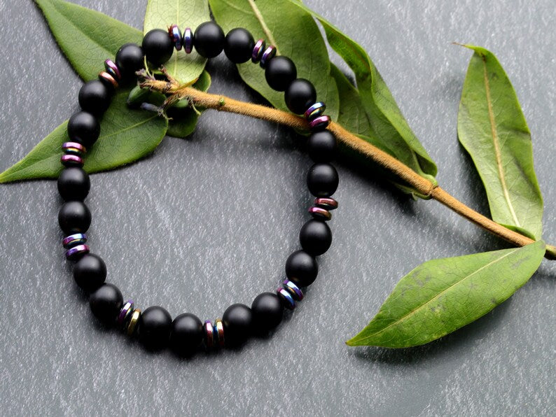 Curious matte Agate combined with Grade A Non-magnetic Hematite Rondelle Multi-color Plated.  Strung on durable stretchy cord