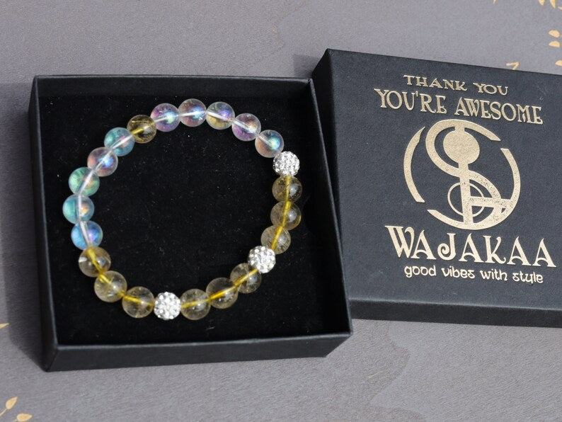 Gahiṇā Jewel Collection - Unique Bracelet with Angel Aura with Top quality Rutilated quartz beads. Extra 3x Pave Disco Ball Beads