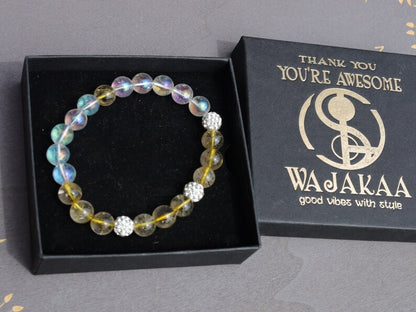 Gahiṇā Jewel Collection - Unique Bracelet with Angel Aura with Top quality Rutilated quartz beads. Extra 3x Pave Disco Ball Beads