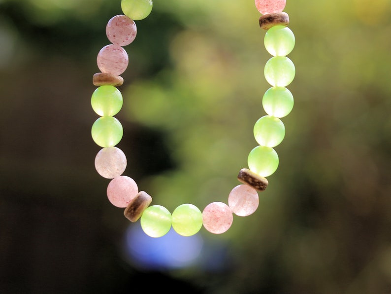 Viśēśa Jewel Collection - Ethereal Strawberry Quartz bracelet with amazing Peridot beads. can help you to trust your own inner voice