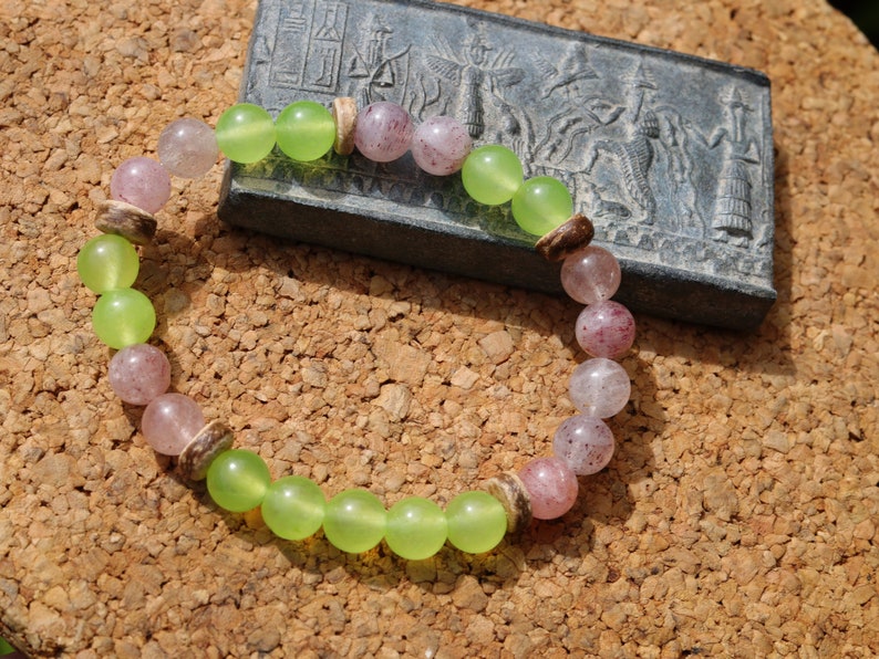 Viśēśa Jewel Collection - Ethereal Strawberry Quartz bracelet with amazing Peridot beads. can help you to trust your own inner voice
