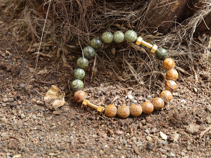 Uncommon Strong Serpentine bracelet with unique Elephant Skin Jasper beads.  helping you to feel more in control of your life