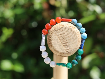8 gemstones bracelet. Magnesite, Carnelian, Red Sea Sediment Jasper, Apatite. Jasper Cerise, Red Netstone, Dark Turquoise, Jasper Slate Blue