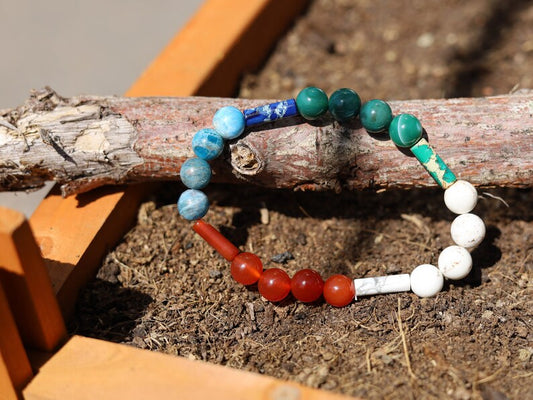 8 gemstones bracelet. Magnesite, Carnelian, Red Sea Sediment Jasper, Apatite. Jasper Cerise, Red Netstone, Dark Turquoise, Jasper Slate Blue