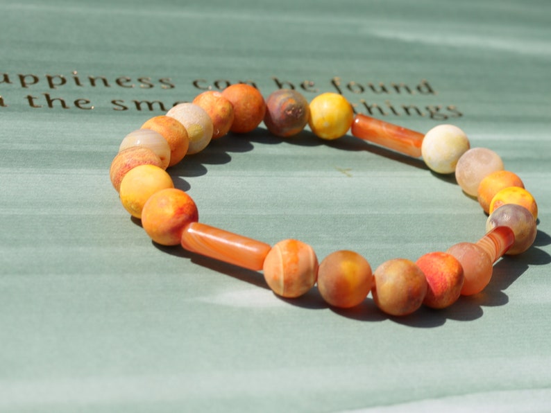 Unique Multicolored sunstone matt orange natural stone beads bracelet combined with 3x Carnelian tube beads.