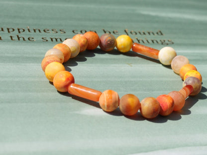 Unique Multicolored sunstone matt orange natural stone beads bracelet combined with 3x Carnelian tube beads.
