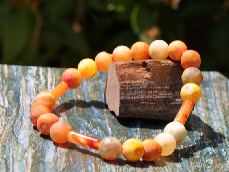 Unique Multicolored sunstone matt orange natural stone beads bracelet combined with 3x Carnelian tube beads.
