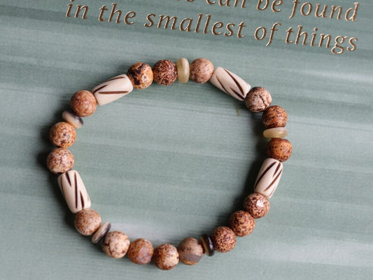 Bone gemstone jewelry. Natural Stone Beads Leopardskin Jaspers Beads with beautiful handmade white bone with decorations.