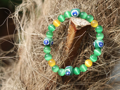 Trade beads jewelry. Green Cat Eye Beads, Round, 4x gold Cat Eye beads. With 4 fantastic Ghana powder Glass Trade Beads