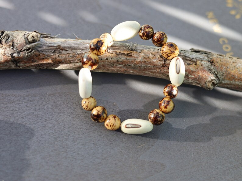 Unique handmade ethically sourced bone/ horn gemstone jewelry. Bone Beads are intricate, beautiful and natura