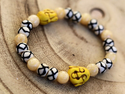 Topaz Jade Beads bracelet with Howlite bead Buddha yellow. absorb, and clear the constant stream of chatter from the mind. Haḍīāṁ