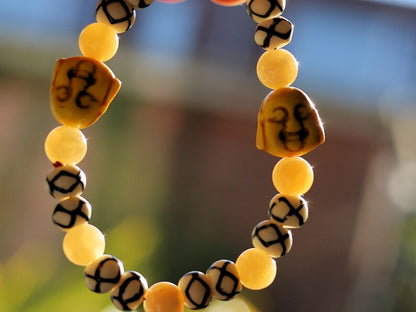 Topaz Jade Beads bracelet with Howlite bead Buddha yellow. absorb, and clear the constant stream of chatter from the mind. Haḍīāṁ