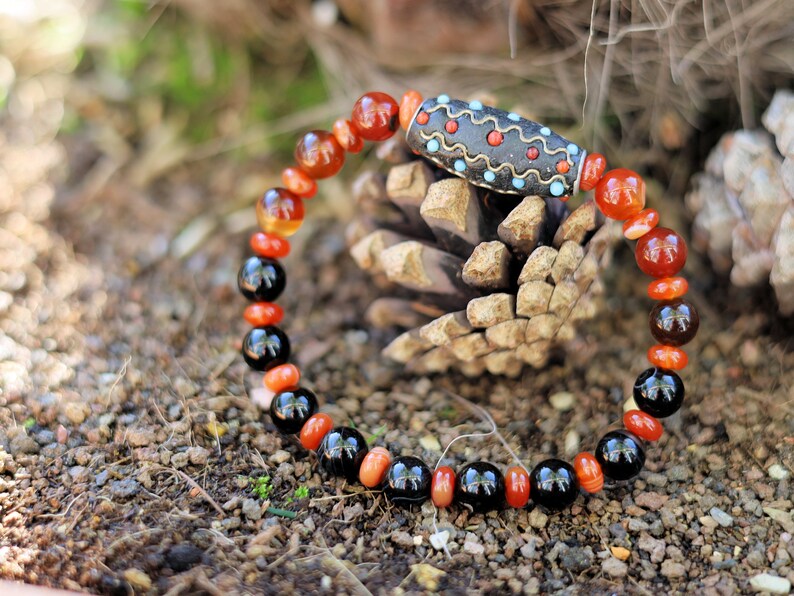 Stone Banded Black Lace Agate Round Beads bracelet with Kashmiri beads are also known as Bollywood beads.
