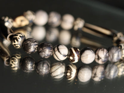 Black Silk Stone/Netstone Beads  bracelet with handmade Oxbone Tibetan prayerbeads. Haḍīāṁ Jewel