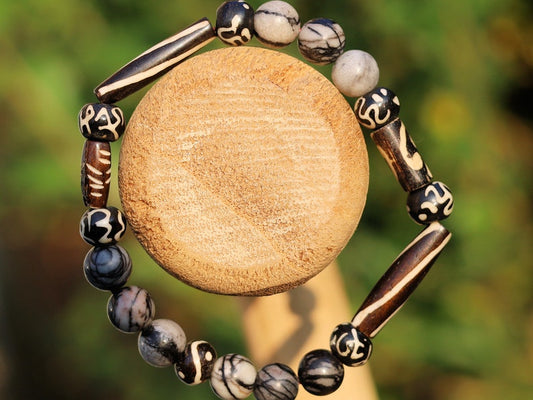 Black Silk Stone/Netstone Beads  bracelet with handmade Oxbone Tibetan prayerbeads. Haḍīāṁ Jewel