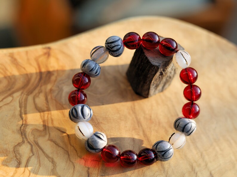 Unique Mexico red blood Amber beeswax beads Certified 10mm combined with Wavy Line Bone Beads: 12mm x 9mm grey & Black Rondelle Spacers.