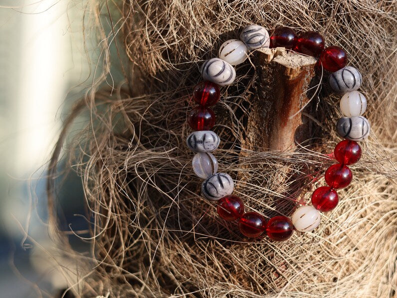 Unique Mexico red blood Amber beeswax beads Certified 10mm combined with Wavy Line Bone Beads: 12mm x 9mm grey & Black Rondelle Spacers.