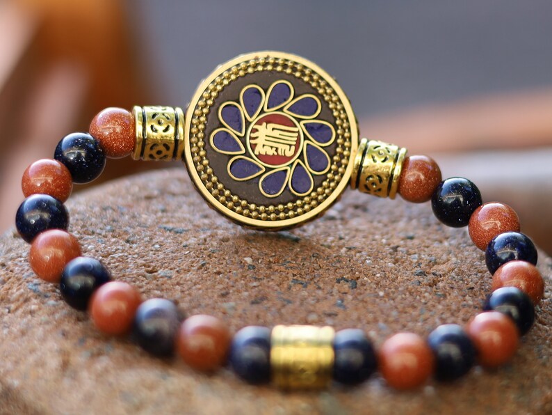 Sparkly bracelet Goldstone beads with Handmade Nepalese Buddhist Tibetan Brass Metal & Clay Loose Craft Bead. Your satisfaction, our pursuit