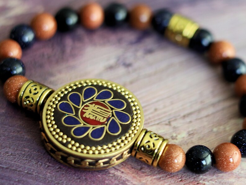 Sparkly bracelet Goldstone beads with Handmade Nepalese Buddhist Tibetan Brass Metal & Clay Loose Craft Bead. Your satisfaction, our pursuit