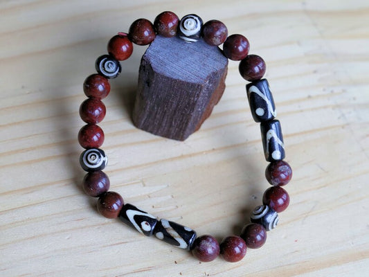 Bone gemstone jewelry. Red Brecciated Natural Jasper bracelet combined with Batik bone and special Tibetan Prayer beads: Ox Bone.