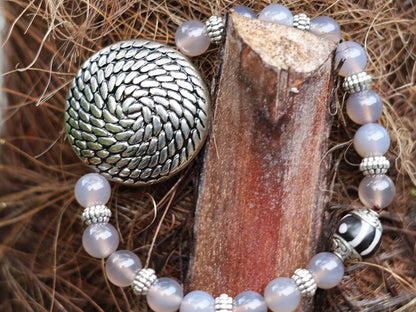 Quality AAA Gray Agates Natural Stone bracelet with a Unique Silver color metal look coin and Tibetan Style dZi Bead.