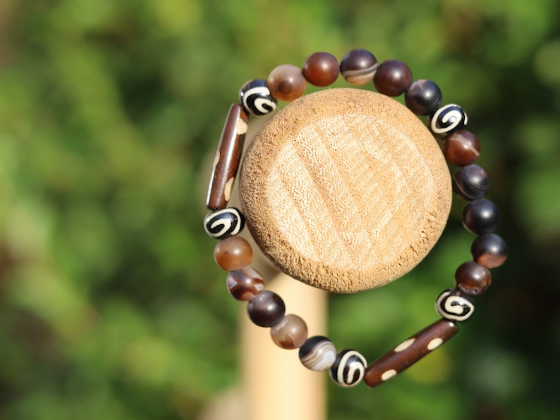 Matte Stripe Brown Agates Striped Lace Onyx Beadst with handmade Oxbone Tibetan prayerbeads. Haḍīāṁ Jewel winter Collection