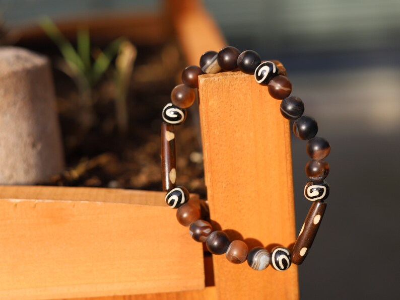 Matte Stripe Brown Agates Striped Lace Onyx Beadst with handmade Oxbone Tibetan prayerbeads. Haḍīāṁ Jewel winter Collection