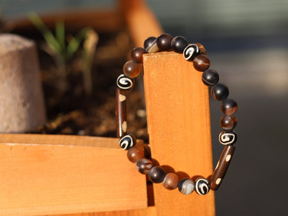 Matte Stripe Brown Agates Striped Lace Onyx Beadst with handmade Oxbone Tibetan prayerbeads. Haḍīāṁ Jewel winter Collection