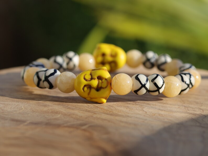 Topaz Jade Beads bracelet with Howlite bead Buddha yellow. absorb, and clear the constant stream of chatter from the mind. Haḍīāṁ